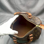 Louis Vuitton Speedy 30 opened wide, showing both handles and the side leather tabs